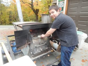 Jonah Wheeler making maple pizza 